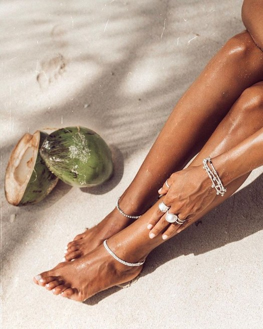Sun-warmed sand, shells and jewelry